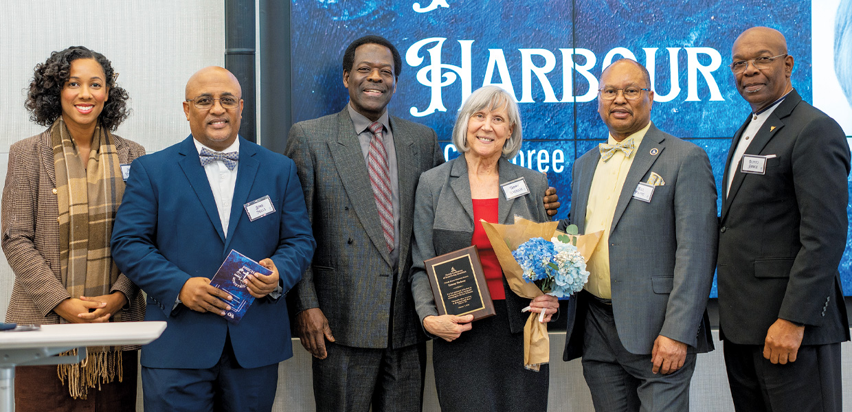 Participant receives a recognition award.